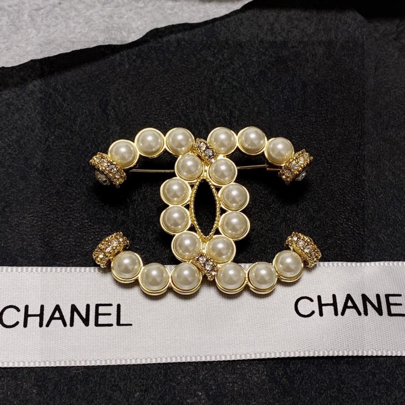 Ch*el brooches